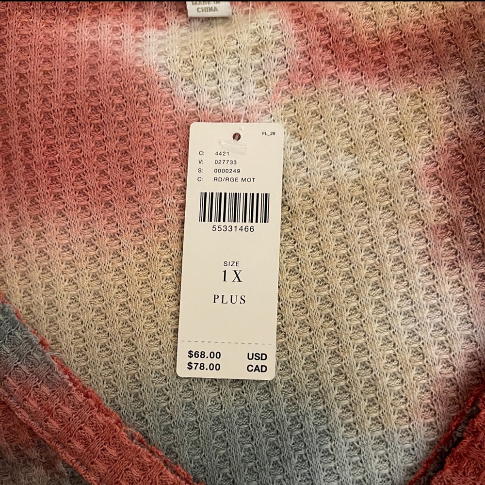 Multi  color peplum top from Anthropologie.  Size 1x new with tags